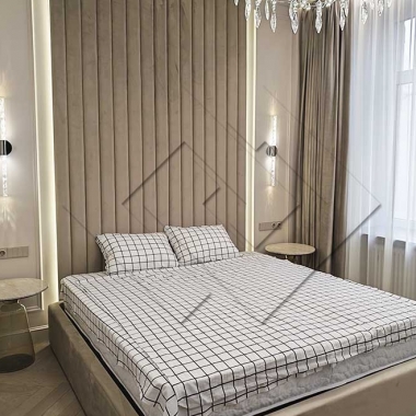 Мягкое изголовье в спальне 